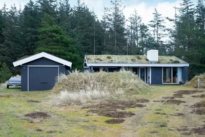 Image de Maison de vacances pour 6 a Blokhus-By Traum