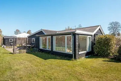 Image de Maison de vacances pour 8 a Grenaa-By Traum