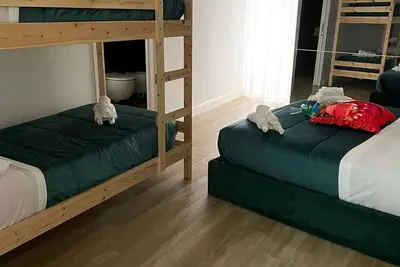 Image de Quadruple Room. Berenice Suites