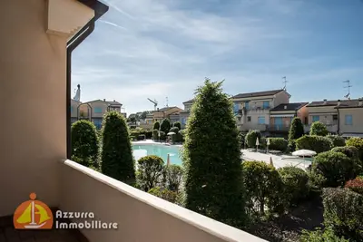 Image de Appartement 'Residence Borgo Dei Fiori E08' avec piscine partagée et terrasse privée