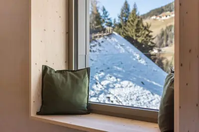 Image de Appartement 'Lena Dolomites Luxury Suite' avec vue sur les montagnes, terrasse privée et sauna