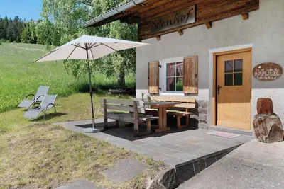 Image de Maison de vacances 'Waldchalet Ödenhof' avec vue sur la montagne, jardin privé et Wi-Fi