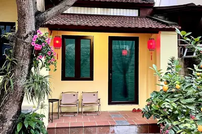 Image de Ngôi Nhà Việt Ấm Cúng Hướng Sân Vườn Giường Cỡ Queen