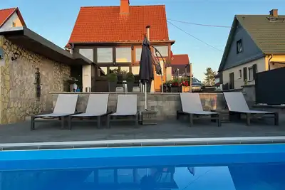 Image de Maison de vacances 'Eisfelder Blick' avec piscine privée, terrasse privée et Wi-Fi