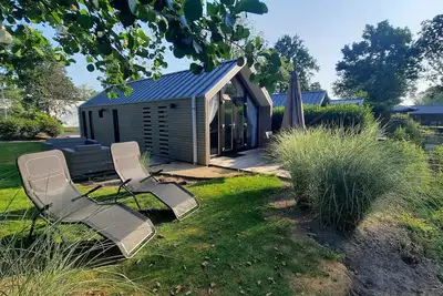 Image de Gemütliches Holland-beachhouse 40m² mit Garten, Blick Aufs Wasser im Ferienpark