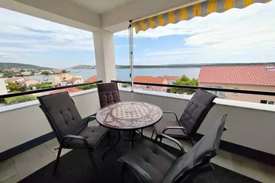 Image de Appartement de deux chambres avec le balcon et la vue sur le mer Barbat, Rab (A-22251-a)