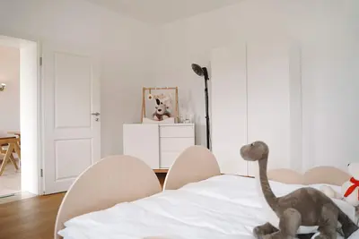 Image de Black Horse Family Appartement. Kinderzimmer, Kinderwagen, Babybett. Alles da!