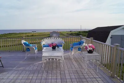 Image de Shoreline Cove! Indulge in mesmerizing sunsets, rustic soothing beaches