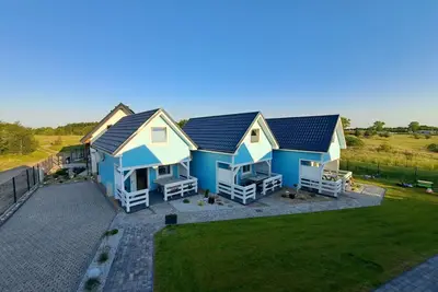 Image de Maisons de vacances confortables pour 8 personnes.