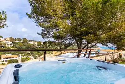 Image de Cala Mendia Beach House 1 in front of the beach with sea views