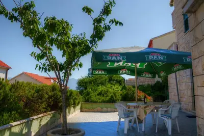 Image de Appartement de deux chambres avec la terrasse Postira, Brac (A-22207-a)