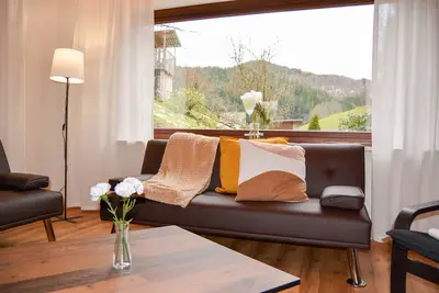 Image de Appartement \"Sonnenglück\" avec vue sur les montagnes, terrasse privée et Wi-Fi