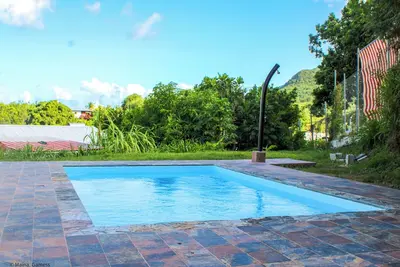 Image de Bas de villa F2 neuf avec terrasse et piscine proche plages Diamant