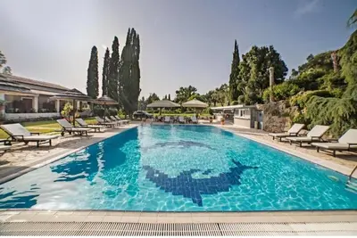 Image de Appartement dans un hôtel \"Corfu Club Maisonette I\" avec piscine partagée, balcon et Wi-Fi.