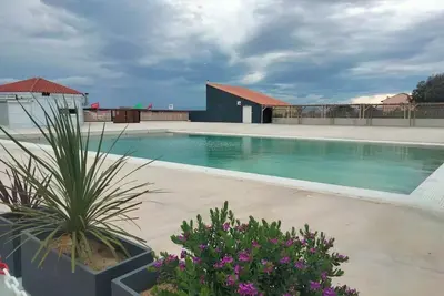 Image de Appartement avec vue sur lac marin, piscines et terrasse privée