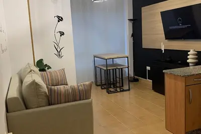 Image de Indiano's Mansion. Apartment in tourist area 10 minutes from the beach.