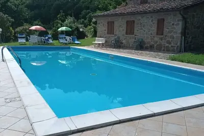 Image de Maison de Campagne à Volterrano avec 3 chambres à coucher, 7 couchages