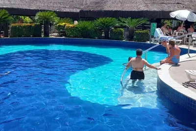 Image de Apartamento Para Famílias com Várias Piscinas e Também Conta com Hidromassagem