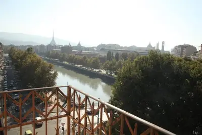 Panoramic two-room apartment on the banks of the Dora River - Da Momo