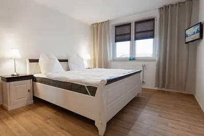 Appartement 'Haus Strandeck Südstrand 17' avec terrasse privée, balcon et Wi-Fi