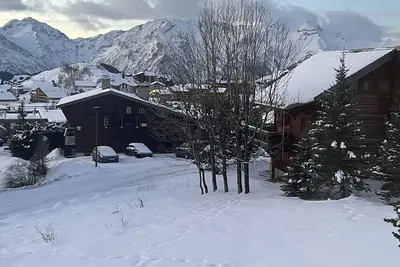 Image de Bel appartement rénové au pied des pistes, lumineux, vue montagne, certifié 4*.