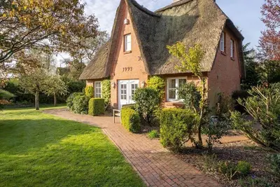 Image de Reetdachhaus Strandleben