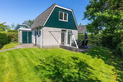 Image de Dune Bungalow directly against the dunes for 4 persons. Magnificent nature, walking, cycling, enjoying.