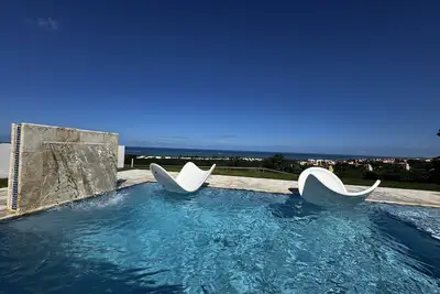 Endless ocean views and pool, by El Yunque.