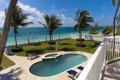 Spacious Oceanfront Estate with pool and direct access to a private beach.