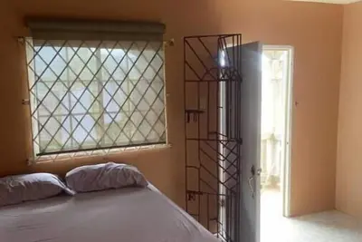 Image de Cozy accommodation in the cool hills of, Mandeville with a view of the ocean