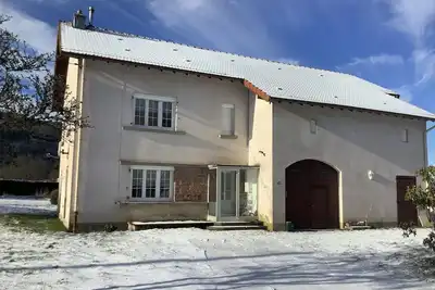 Image de Gite dans ferme rénovée dans un village vosgien, proche des commerces.