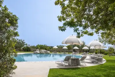 Image de Appartement 'Tenuta Vigna Corallo - Dalia' avec piscine partagée, Wi-Fi et climatisation