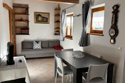 Image de Appartement 'Goldener Schnee Tesero' avec vue sur les montagnes, terrasse privée et Wi-Fi