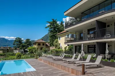 Image de Appartement \"Erbacher - Anna's Garten Suite\" avec vue montagne, piscine partagée et bain de vapeur