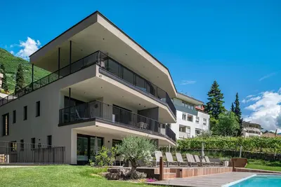 Image de Appartement \"Erbacher - Greti's Landhaus Suite\" avec vue sur montagne, piscine partagée, sauna privé