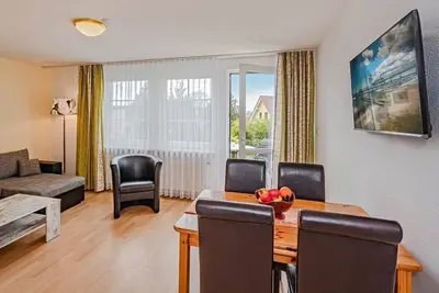 Image de Ferienwohnung Waldhaus 4. 1 - GemĂĽtlicher Ferienbungalow in Ruhiger Waldrandlage, 800 m vom