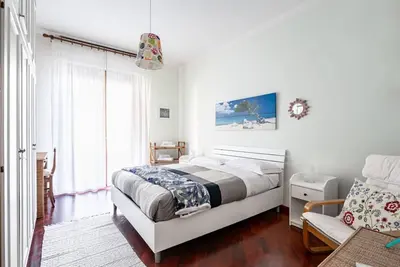 Image de Roomy apartment of about 110 sqm, located on the second floor of a modern building with lift (Not suitable for disabled people) with some steps at the entrance. The accommodation can accommodate up to 6 people and is located in a strategic residential ar