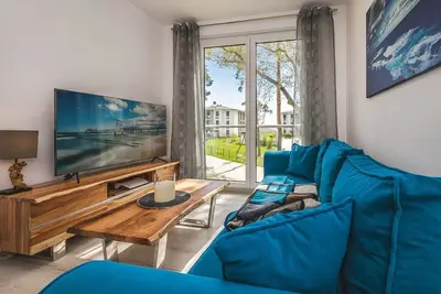Image de Ferienwohnung Meerzeit - Hochwertiges Appartement in Ruhiger Lage, mit Terrasse, Kostenfreier Sauna
