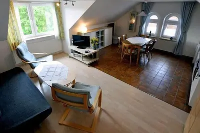 Image de Familienfreundliche Ferienwohnung mit Zwei Separaten Schlafzimmern!