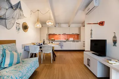 Image de Le bungalow chic de 2 chambres du Lino delle Fate Eco Resort peut accueillir 5 personnes