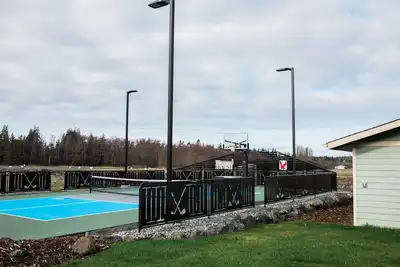 Image de \"The Bunker House\" With Sports Court!