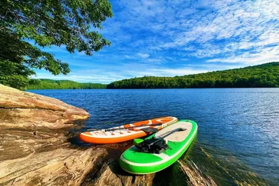 Adventure awaits! Fantastic rustic home near lakes, skiing, walk to downtown.