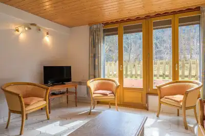 Image de Appartement \"Rez De Jardin\" avec vue sur les montagnes, terrasse privée et Wi-Fi