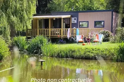 Image de Mobil-home Taos 40m² (3 chambres 2 Sdb) + terrasse au bord de l'étang 6 personnes