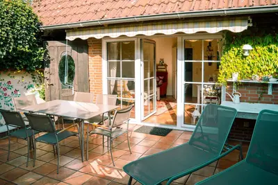 Image de Maison de vacances 'Ferienhaus Jadeblick I I' avec vue sur la mer, terrasse privée et Wi-Fi