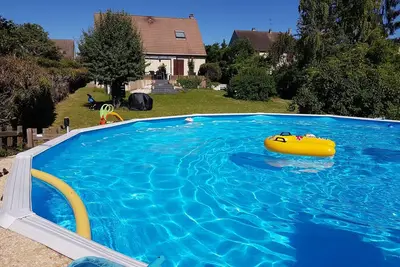 Image de Maison vue Seine-Jardin 1400m2-Piscine chauffée-5 chambres-libre 01/07 au 30/08