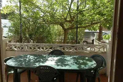 Image de Maison près de la plage avec Wi-Fi gratuit, climatisation en option, animaux acceptés, plage pour chiens