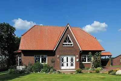 Image de Ferienwohnung Bauernhof Reents in Dunum - Ferienwohnung Reents