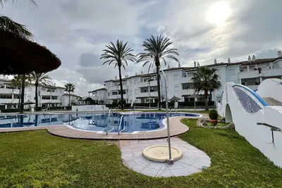Image de Apt. TayMal, avec piscine commune.