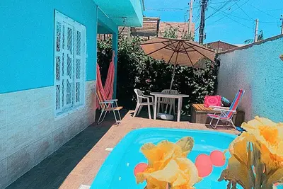 Image de Casa Jardim Secreto. Comodidade e Diversão Próxima da Praia